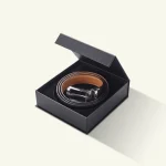 Red rigid belt gift box with rolled belt and buckles