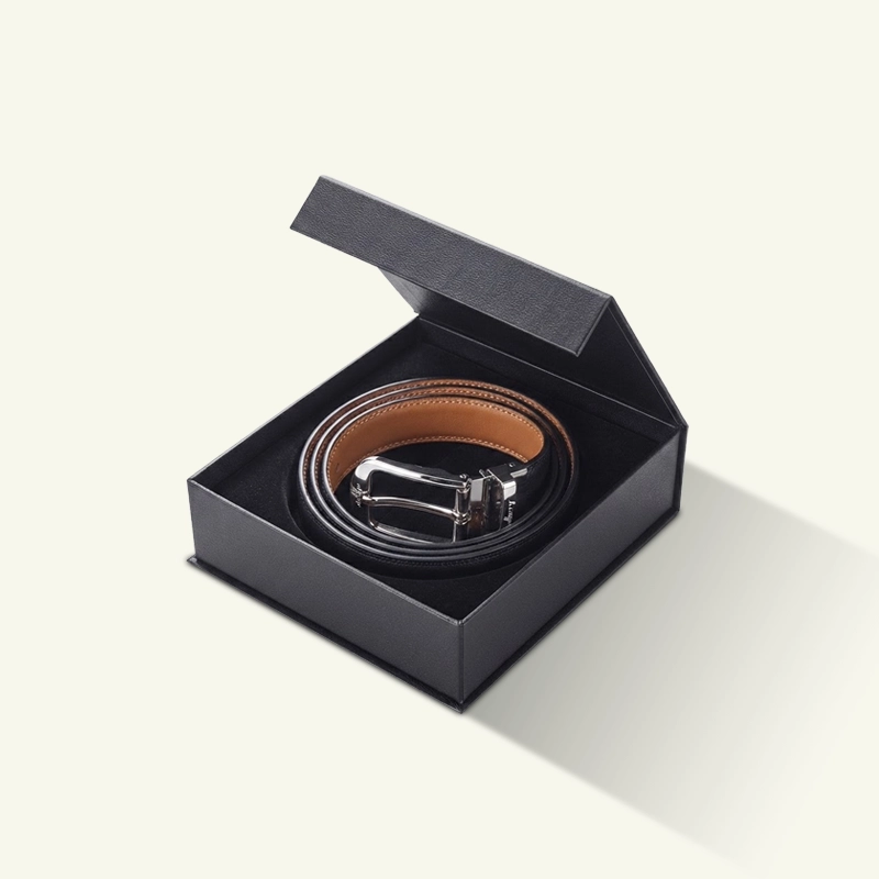 Red rigid belt gift box with rolled belt and buckles